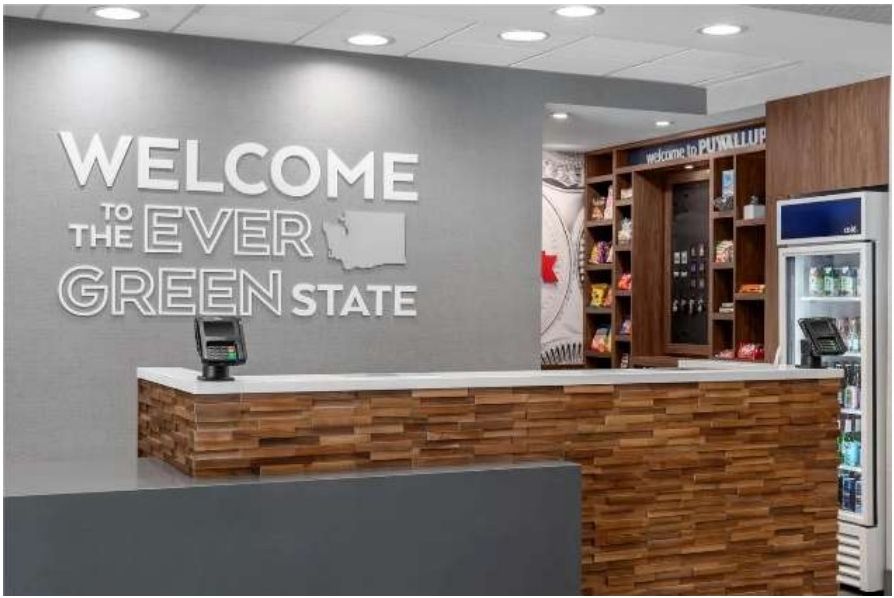 Hotel lobby reception desk at Hampton Inn & Suites
